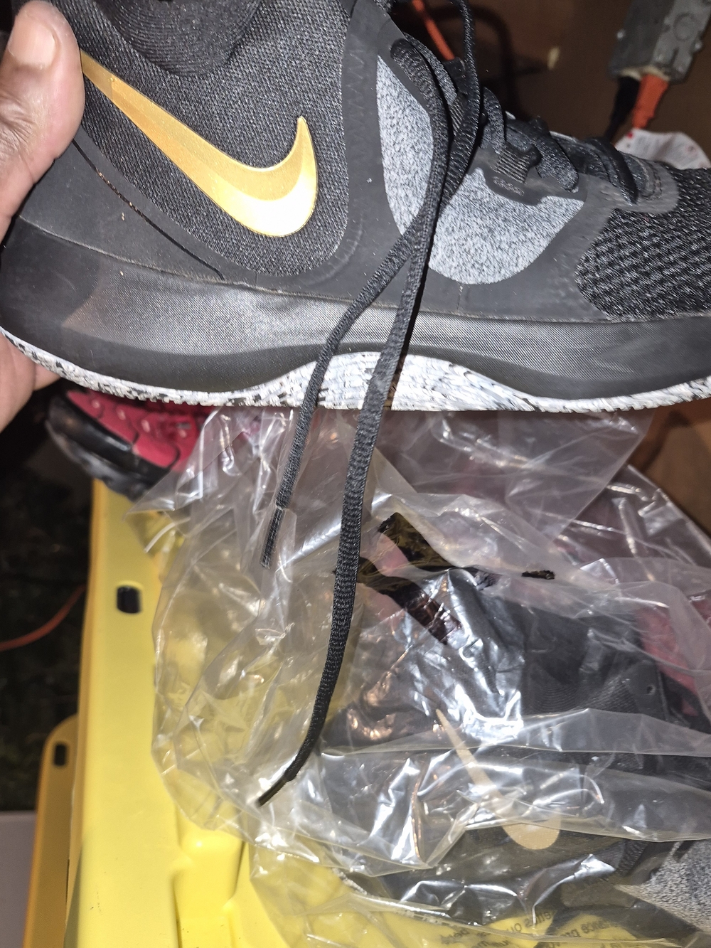 Nike Black and Gold High-Top Athletic Shoe